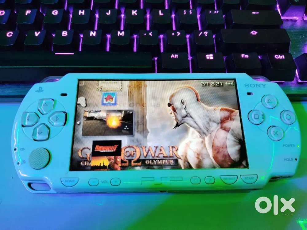 SONY PSP 2000 MODEL WITH 16GB STORAGE IN GOOD WORKING CONDITION .