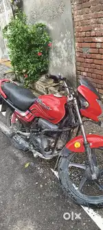 Red bike in good condition selling because buying new bike