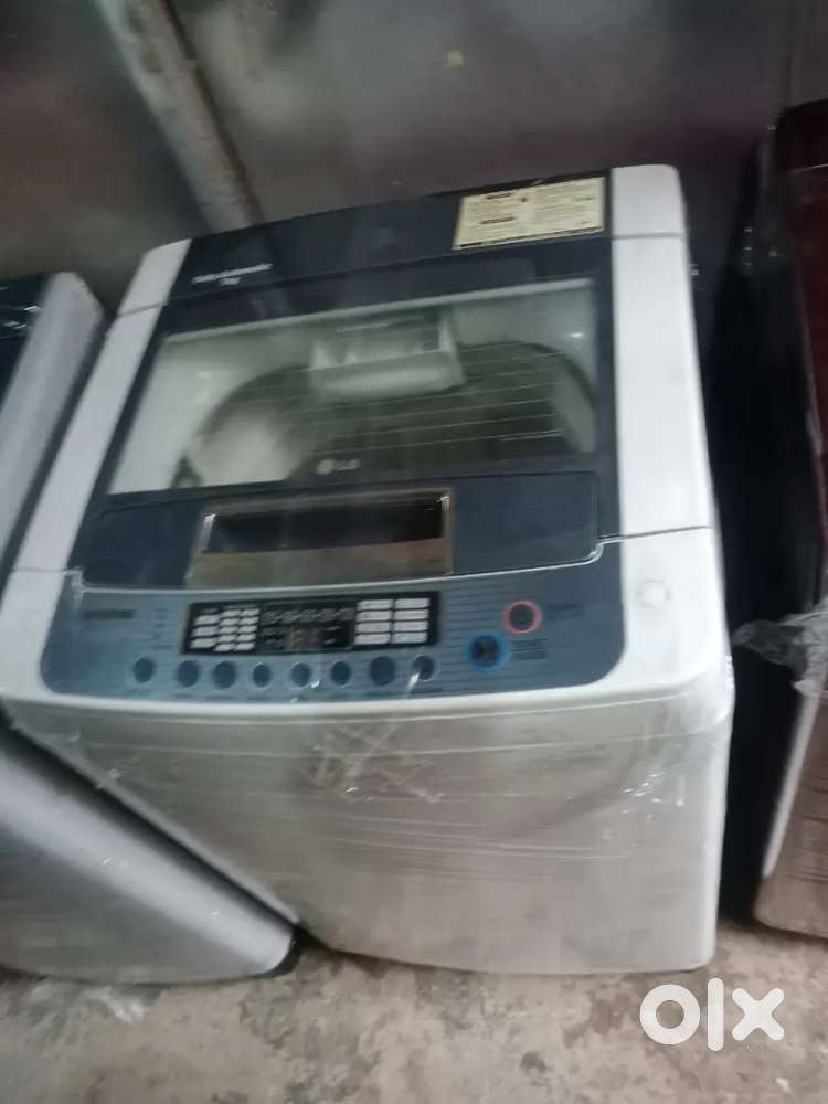 LG washing machine fully automatic top load with warranty 1 year old