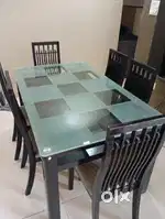 Tempered glass dining table with 6 chairs