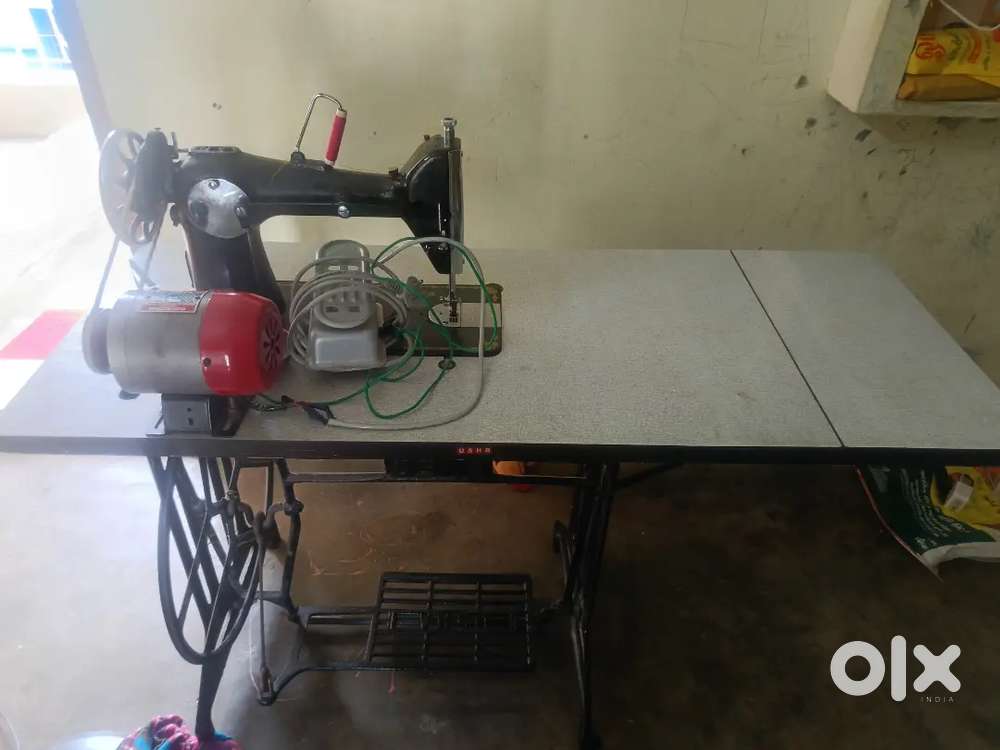 Tailoring machine with motor