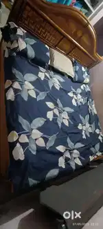Real take wood cot