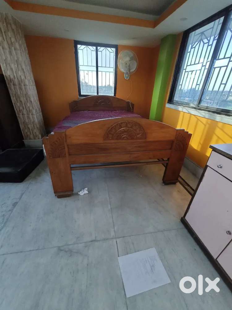 excellent condition shegun wood bed with mattress