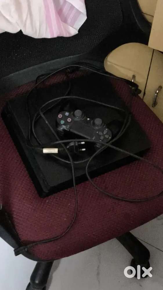 PS4 Slim 1TB – Excellent Condition  Includes a Controller and cables.