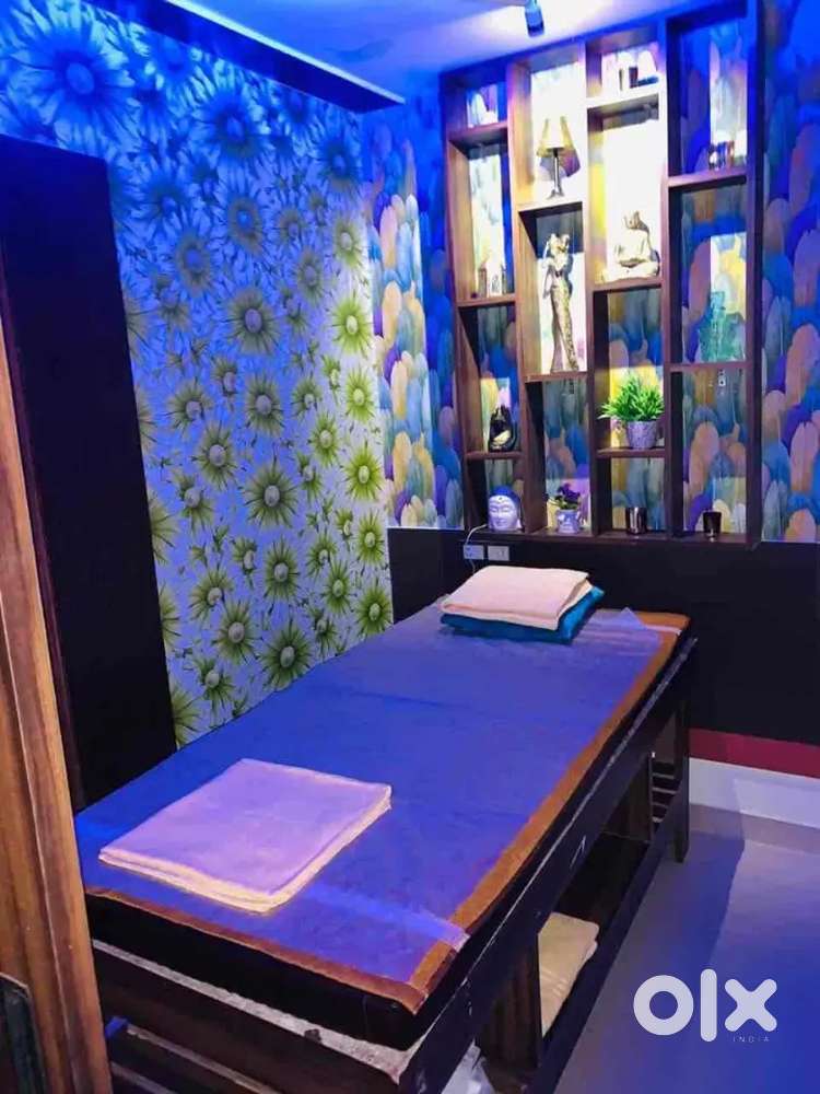 Body massage therapists and office assistant.