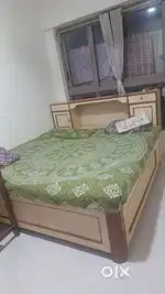 Wooden bed (Excellent condition) available for 21,000