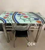 4 seater Glass and steel dining table