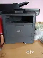 MFC-L5900DW brother printer...new printer only 8000 pages prints