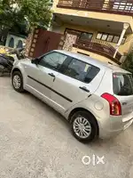 2010 Maruti Suzuko Swift VXI 77,000 km driver, well maintained