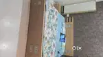 a bed front n back without boxes ana its dressing  table