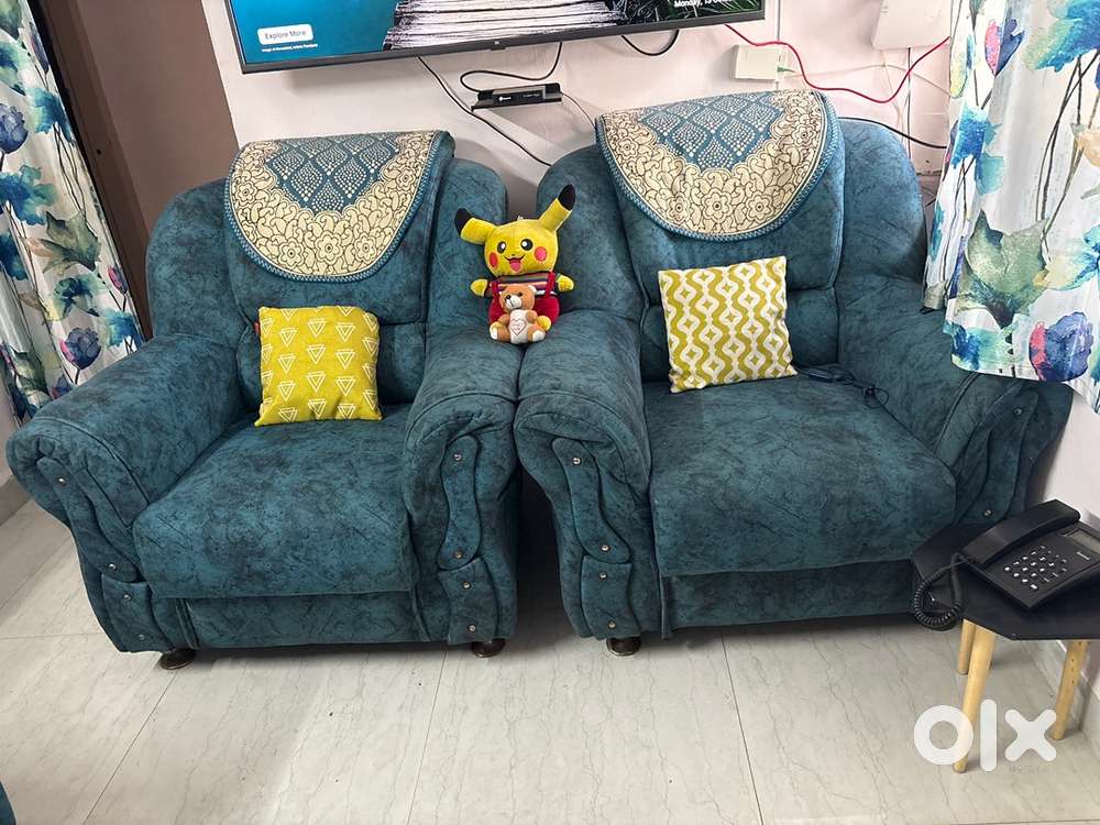 Five seater sofa set full covered turquoise colours just 5 years okd