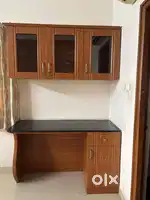 wall mounted wooden rack and study table with storage