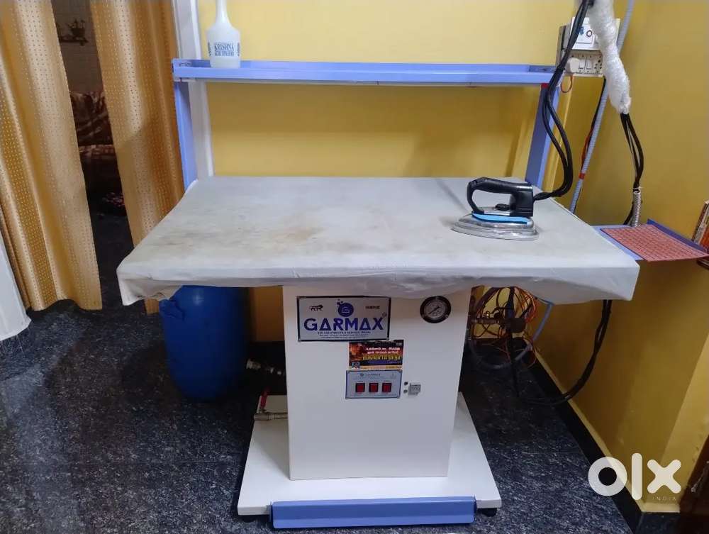 STEAM IRONING MICHINE