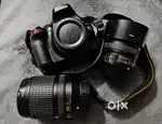 Nikon D5200 18-140 mm zoom lens 50 mm prime lens with Lowepro bag .