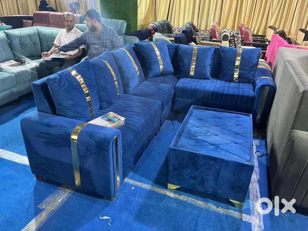 Brand new l shape sofa with pillows and golden strips in STARF