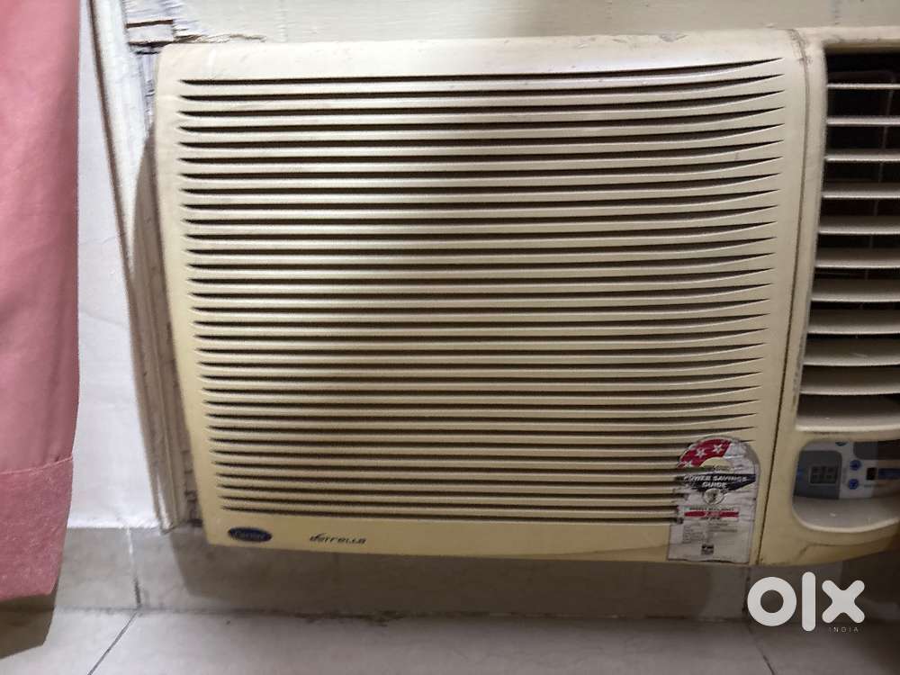 1.5 to. Carrier and 1 ton Loyad window ac