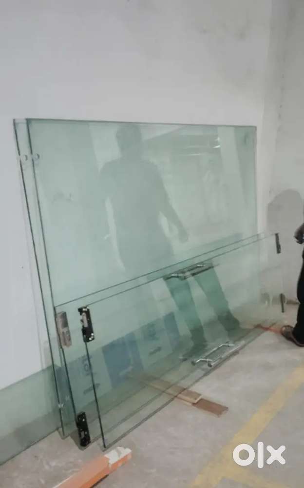 Entry door for for shop in glass