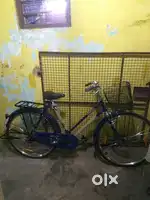 a blue Hero Cycles Avon, likely the 2025 model