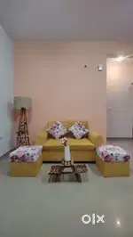 Sofa with 2 mudas 1 lamp 1 small tabel