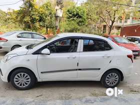 Hyundai xcent company green CNG 2015 December last month single hand drive first owner car well main...