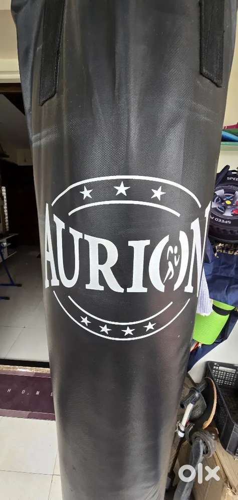 Filled Punching Boxing Bag 4 Feet + Strauss Skate Board Combo