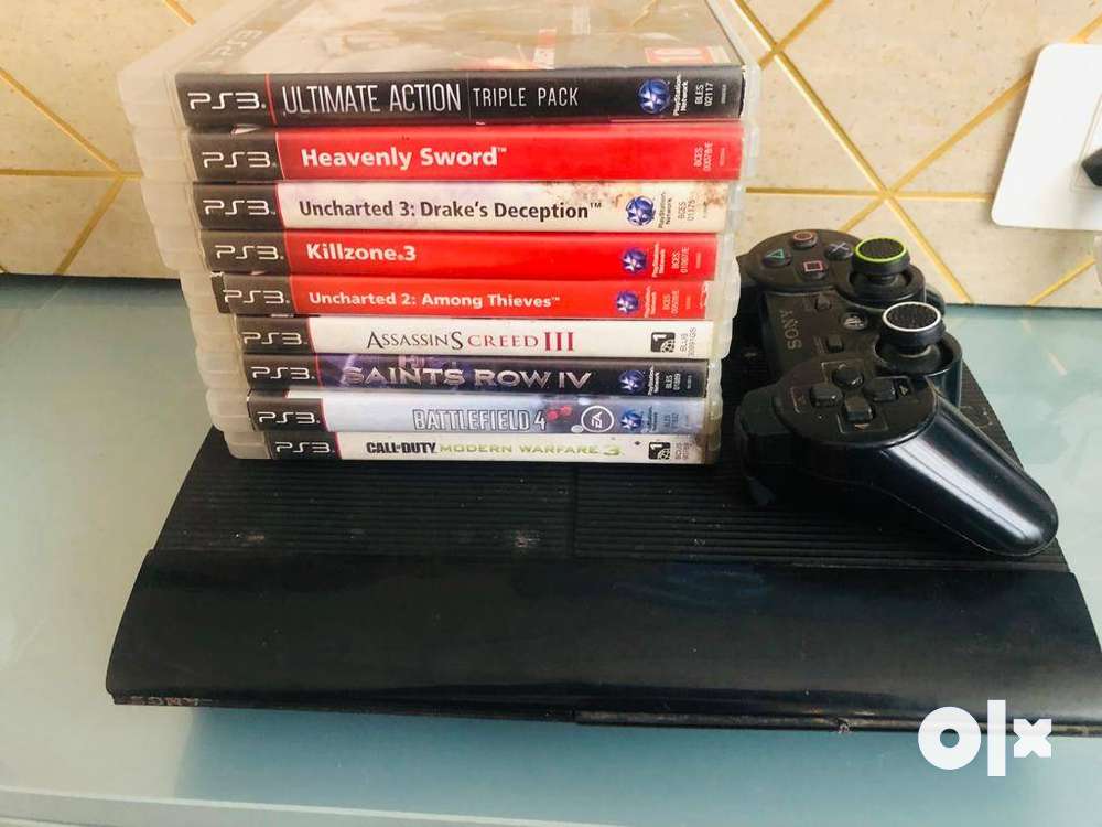 Selling my PS3 console-500gb memory along with 9 Game CD's