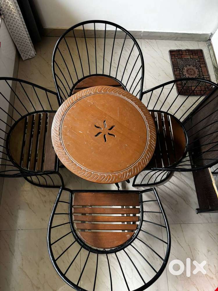 Elegant Round Table with 4 Designer Metal Chairs for Sale