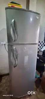 LG double door Refrigerator in active working condition.