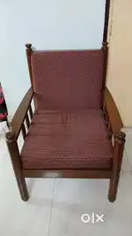 Single wooden chair with cushion