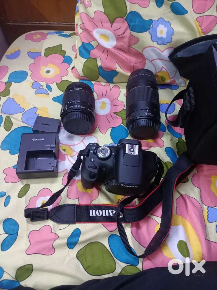 Canon E0S R7 with two lens with bag,made in malasia two month old
