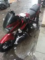 BAJAJ PULSAR RED COLOR WITH BLACK in all top conditions