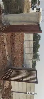 Hi.Iam selling my plot 270sqyd with precost compound wall and gate.