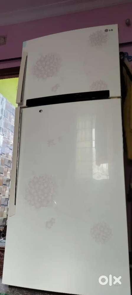LG.. 500+ ltrs fridge with white and pink crystal doors.