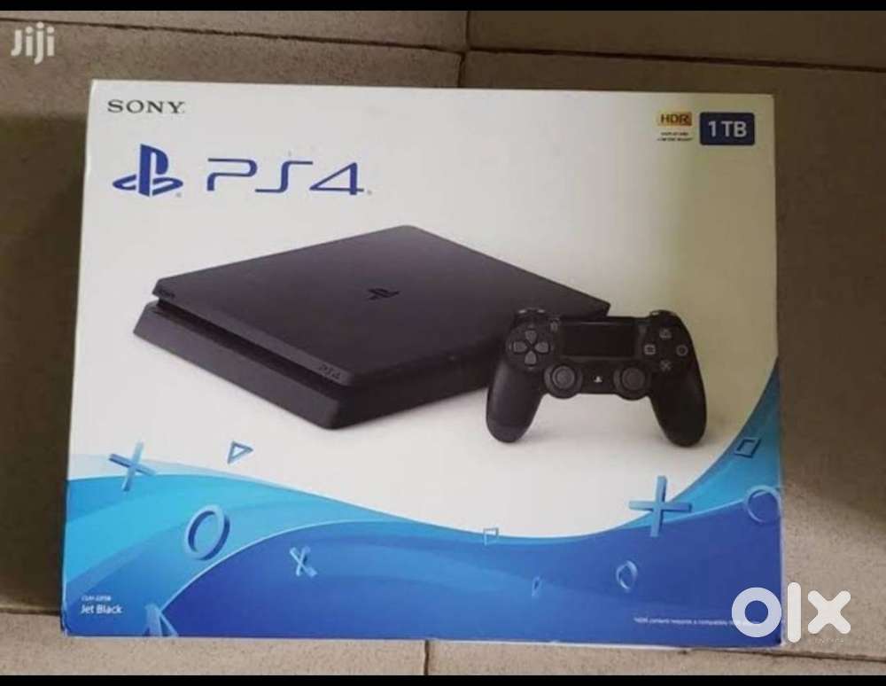 PS4 SLIM 1 TB CONSOLE with 2 dualshock controllers (BOUGHT IN 2018))