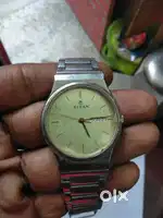 Titan watch sales day and date watch good running