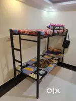 Free delivery.new Double decker cot.
