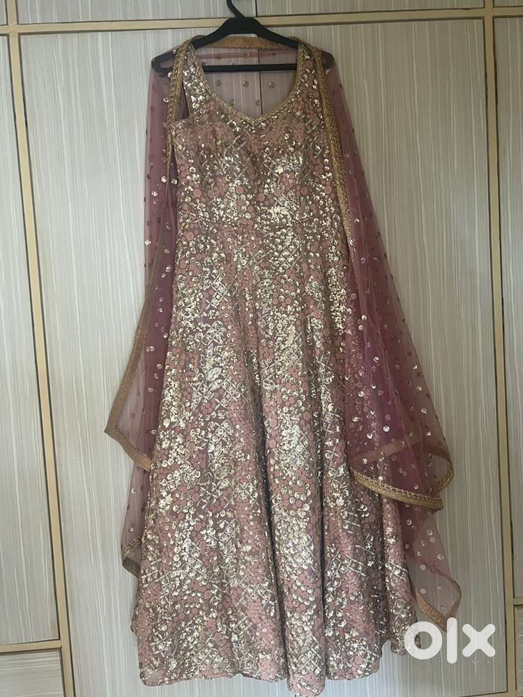 Heay Gown onion clour with thread work and sequence.