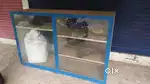 Display cupboard with glass