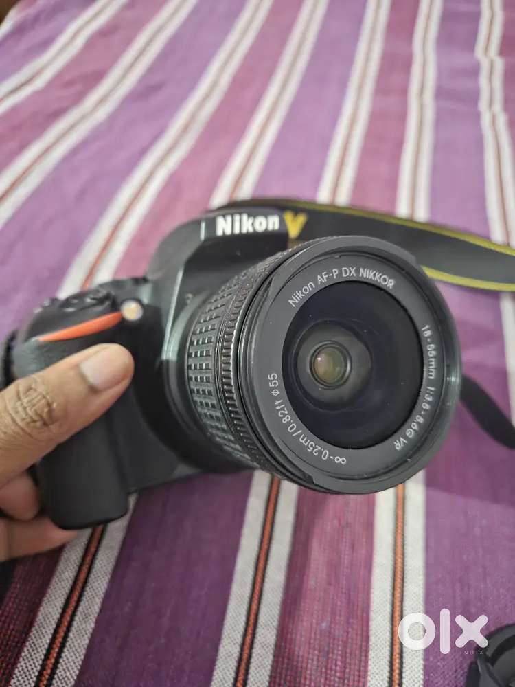 Nikon D3500 with kit lens and zoom lens.