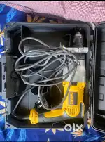 Dewalt drilling with hammer machine