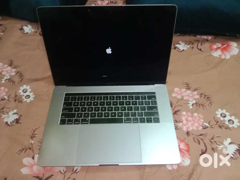 Apple  macbook pro with touchpad