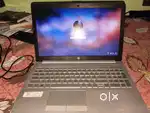 HP laptop with minor dent and peal off