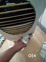 Symphony ice cube air cooler 4 yr old in new condition.