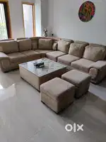 6 seater beige sofa set L shape with 2 ottomans and center table