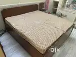 King size wooden bed with mattress