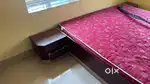 Bed with side table