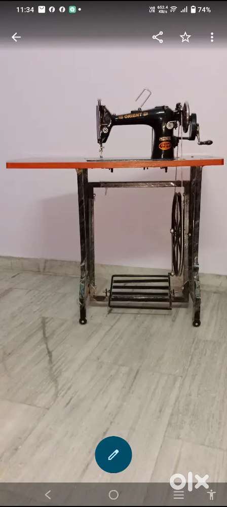 Umbrella silai machine with foot and also manual