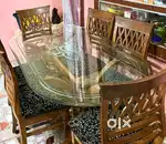 6 seater wooden dining table with glass top