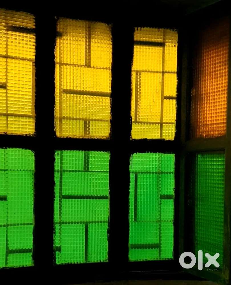 Wooden windows and iron grill