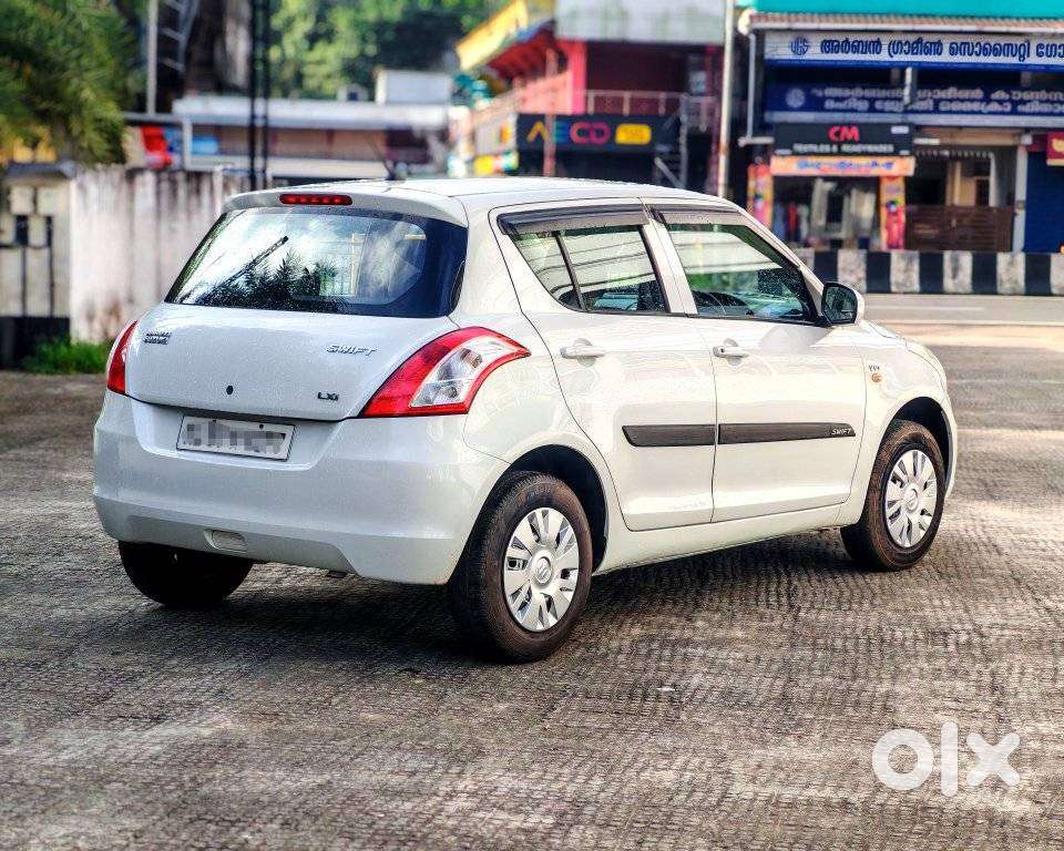 Maruti Suzuki Swift 1.2 LXI (O), 2016